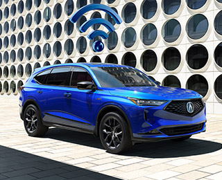 A blue wifi icon floating above a blue Acura MDX parked in front of a futuristic building. // Une icône wifi bleue flottant au-dessus d'un Acura MDX bleu stationné devant un bâtiment futuriste.